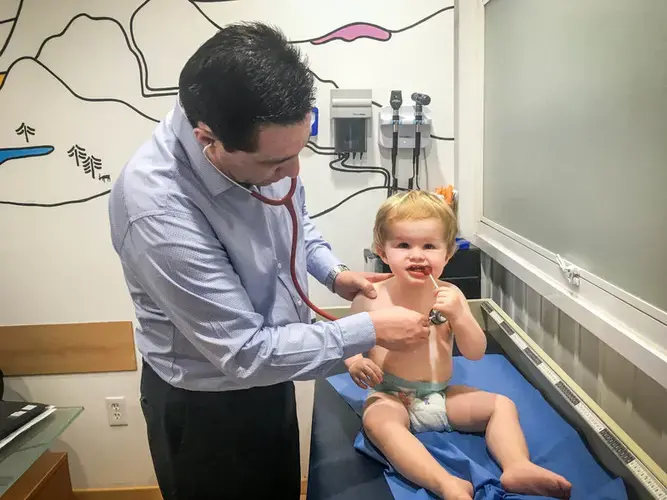 At a checkup in May, a lollipop makes everything OK, even as Dad finds himself consumed with what he admits is irrational fear. Image courtesy Erik Vance. Mexico, 2017.