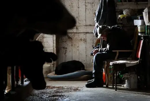 John Rieckmann, 79, takes a break from daily chores in his dairy farm's barn Wednesday. Rieckmann and his wife Mary are struggling to make ends meet and have started a GoFundMe Campaign to help raise to support their farm. Wisconsin, February 2019. Photo by Danny Damiani/USA TODAY NETWORK.