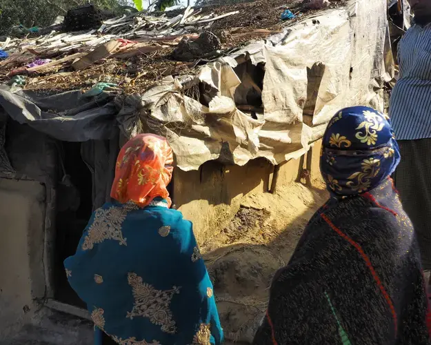 Veiled women in the new settlements outside Balukali Refugee Camp. Nearly all recent refugees live in squatter settlements surrounding the U.N.-run camps, which have been at capacity for decades. Image by Doug Bock Clark. Bangladesh, 2017.