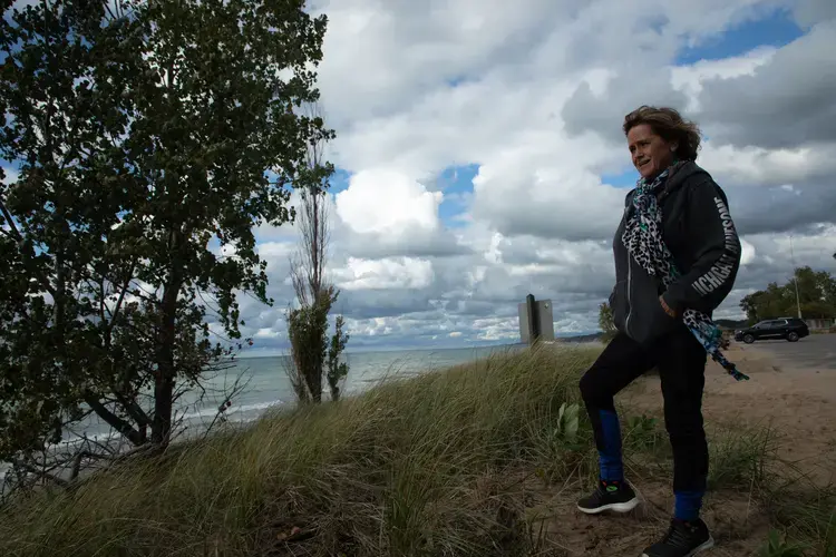 Kathleen Johnson, a retired teacher who has lived in Saugatuck for 40 years, at Oval Beach in Saugatuck, Michigan, on Sept. 29, 2020. Image by Zbigniew Bzdak/Chicago Tribune. United States, 2020.