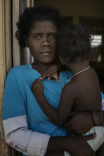 Angeni lost two sisters to the mysterious illness that swept through Kuala Koh in June. “I think about them every day,” she says. Image by James Whitlow Delano. Malaysia, 2019.