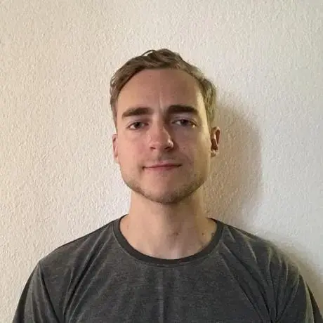 A person with a grey shirt.