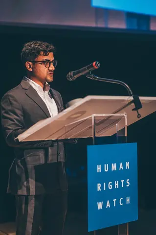 Imran addresses the audience at the Human Rights Watch event