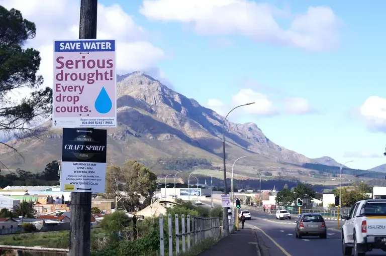 Signs posted in Stellenbosch just outside of Cape Town in English, Xhoosa, and Zulu. Image by Jacqueline Flynn. South Africa, 2018.