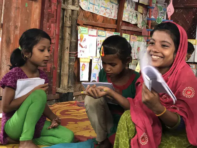 In Bangladesh, many Rohingya children are going to school for the first time. Image by Jaime Joyce. Bangladesh, 2018.