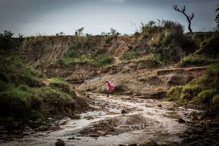 A stream near Nghar Village in Nigeria's Gashish District, where more than 200 people were killed in June by men thought to be cattle herders. Those killed were part of the farming community, which uses land the herders covet. Image by Jane Hahn. Nigeria, 2018.