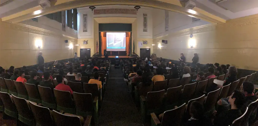 Brian Frank presents his work to the 5th grade class at Kilmer Elementary School. Image by Hannah Berk. United States, 2018.