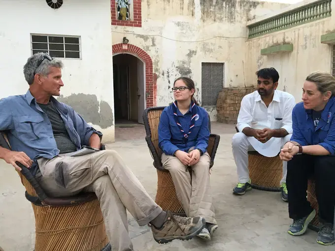 Paul Salopek, Miciah Thacker, Sudhir Kukna and Jenn Hancock gather to say farewell on the evening of the second day on the trail. Image by Mark Schulte. India, 2018.