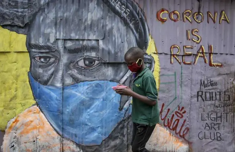 COVID-19 graffiti in Kibera slum, Kenya. Image by Henry Owino. Kenya, 2020. COVID-19 graffiti in Kibera slum, Kenya. Image by Henry Owino. Kenya, 2020.