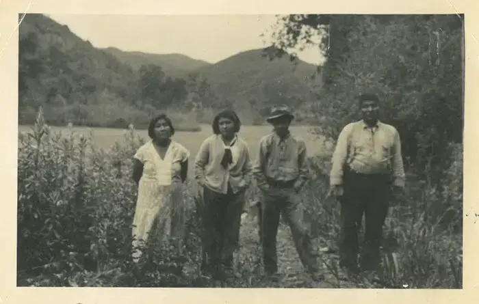 An archival photo from the early to mid-1930s of Allison Herrera's family near Toro Creek, an ancestral village of their Salinan Tribe. From left: Felista Rosas, her great-grandmother; Anna Herrera, her grandmother; Andy Rosas, Anna's brother; and Ramon Rosas, Andy and Anna's uncle. Image courtesy Allison Herrera. An archival photo from the early to mid-1930s of Allison Herrera's family near Toro Creek, an ancestral village of their Salinan Tribe. From left: Felista Rosas, her great-grandmother; Anna Herrera, her grandmother; Andy Rosas, Anna's brother; and Ramon Rosas, Andy and Anna's uncle. Image courtesy Allison Herrera.