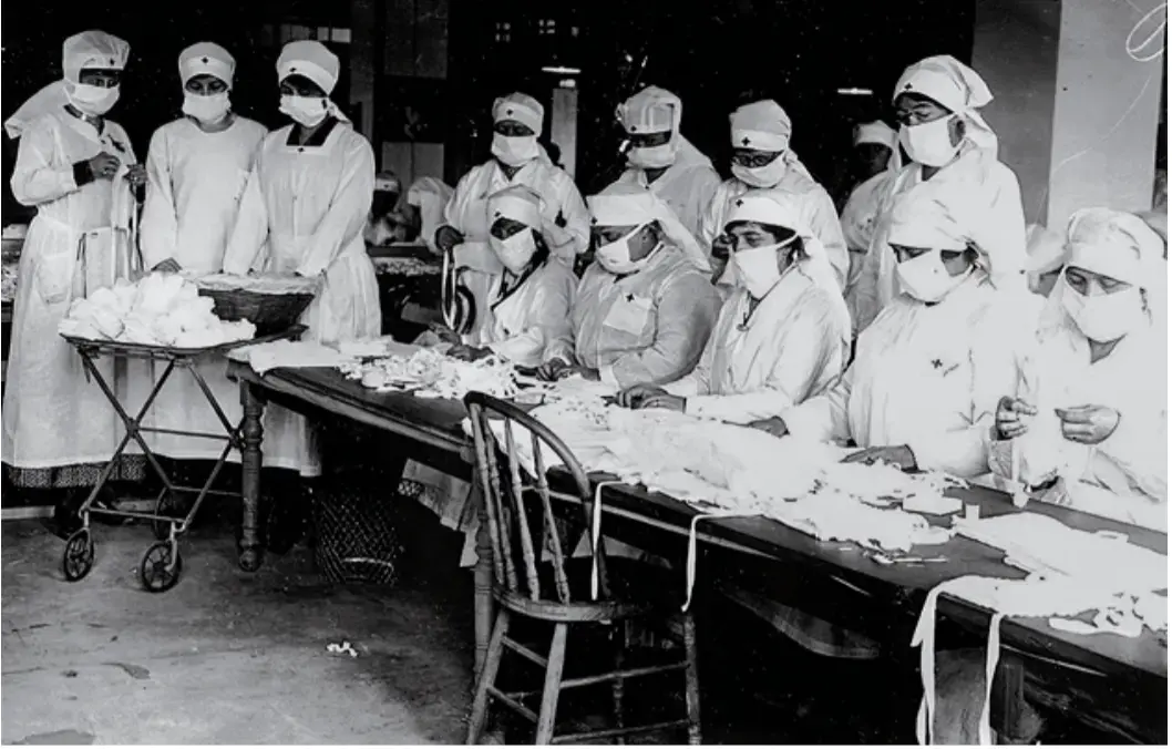 Image of 10 Red Cross volunteers with gauze badges during the 1918 Great Influenza pandmic