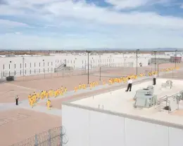 SLAVERY MASS INCARCERTATION THUMBNAIL.png prison yard photo