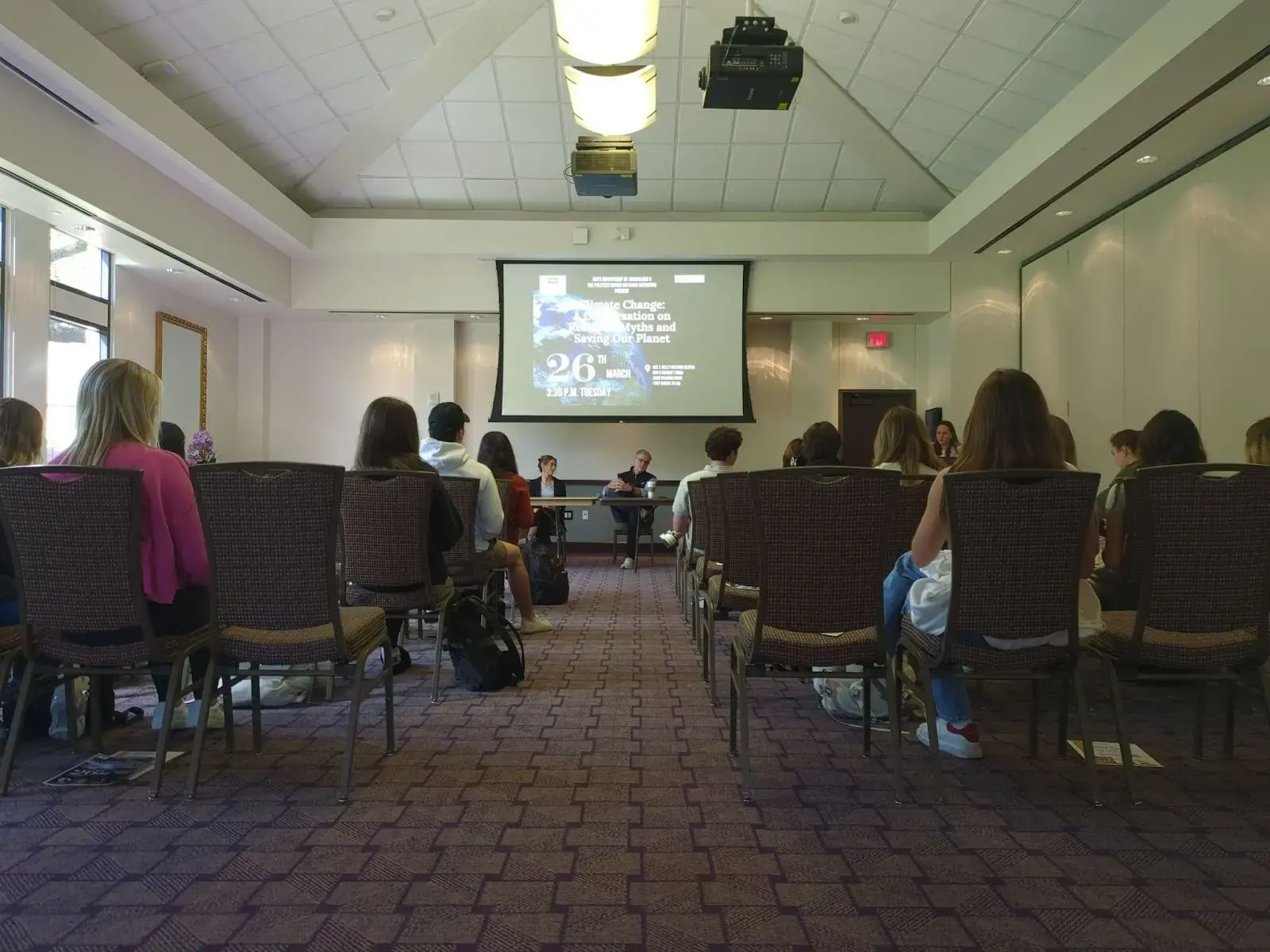 Stephanie Hanes presents to a room of students