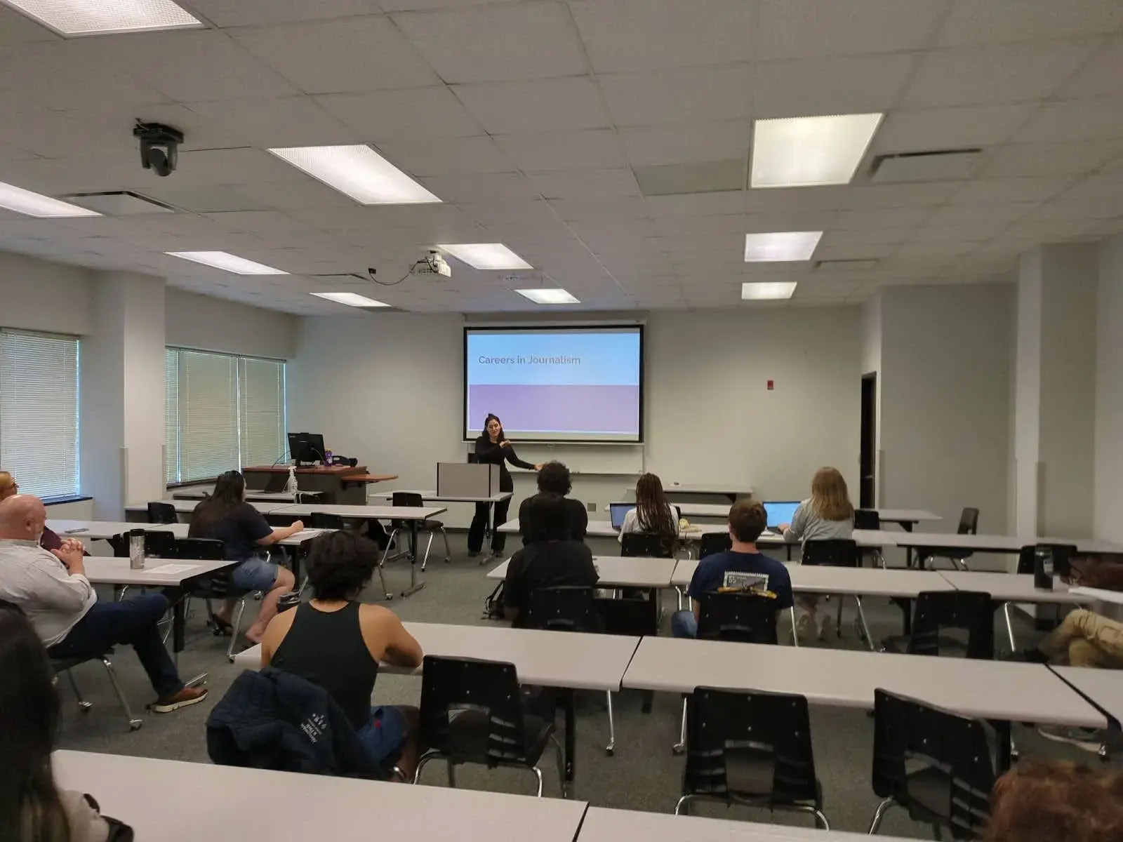 Rosa presents to a classroom at Forsyth