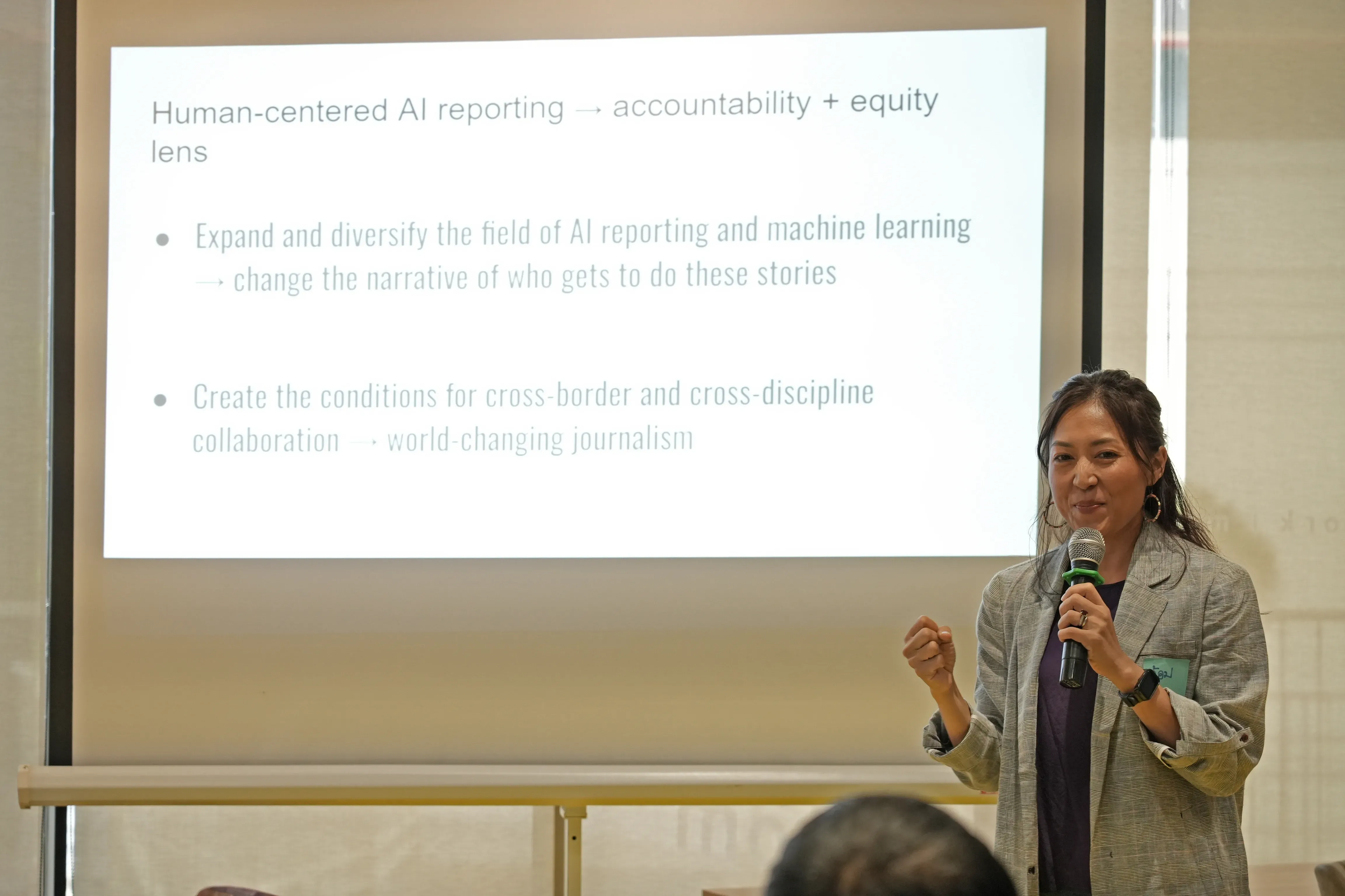 a speaker presents to a workshop event