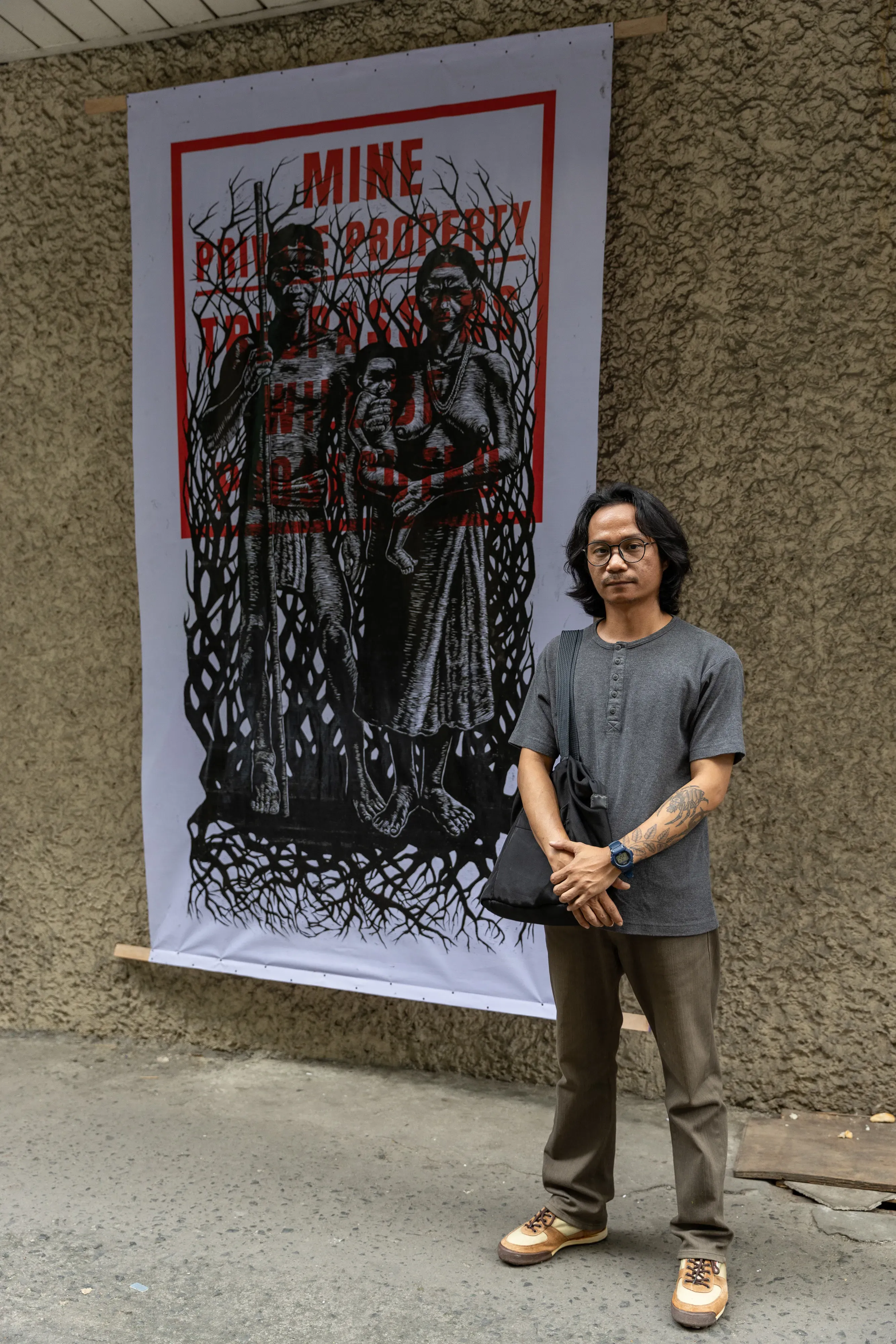 Resty Flores with his artwork