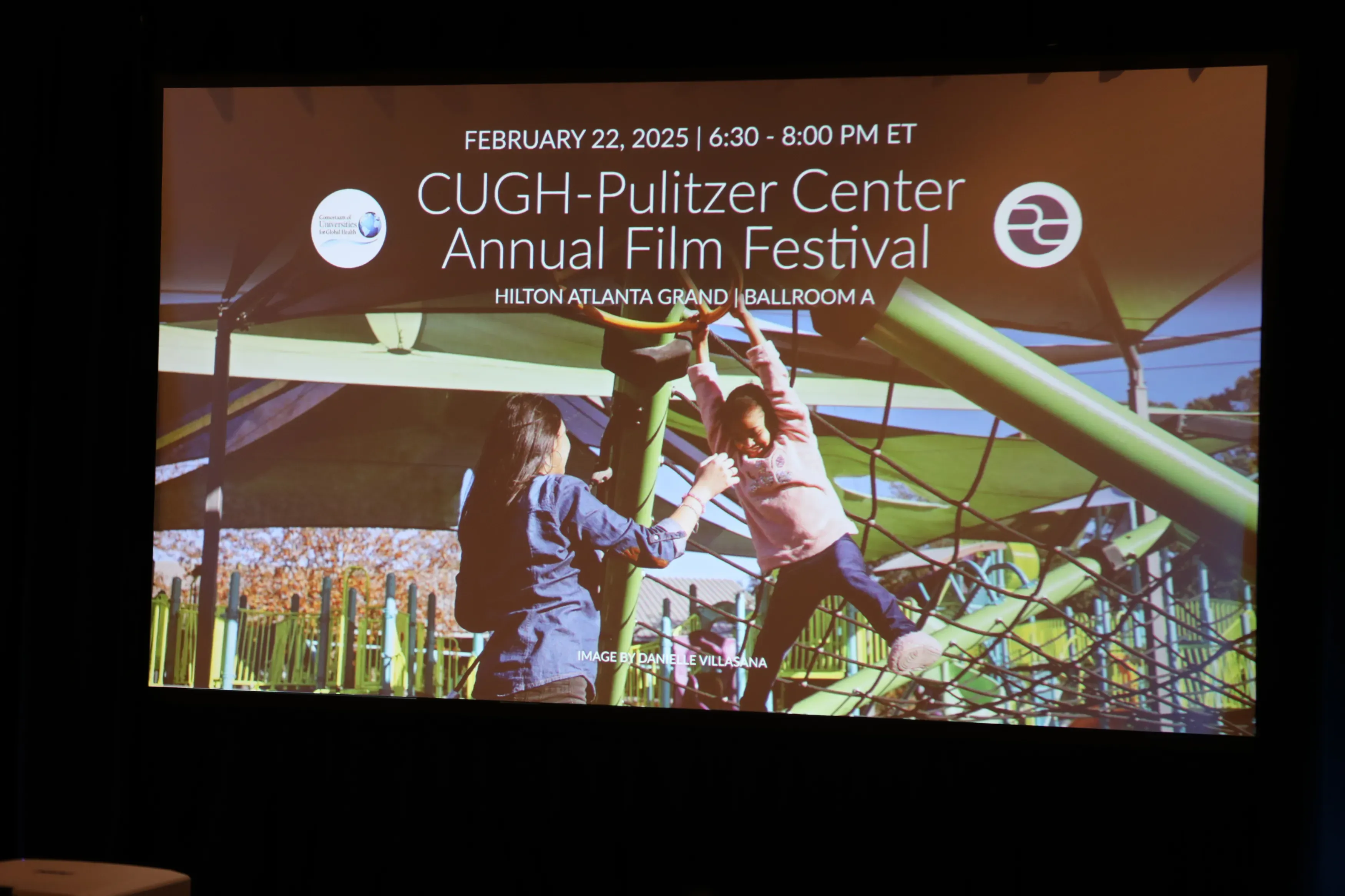 photo of screen at CUGH film festival showing event title