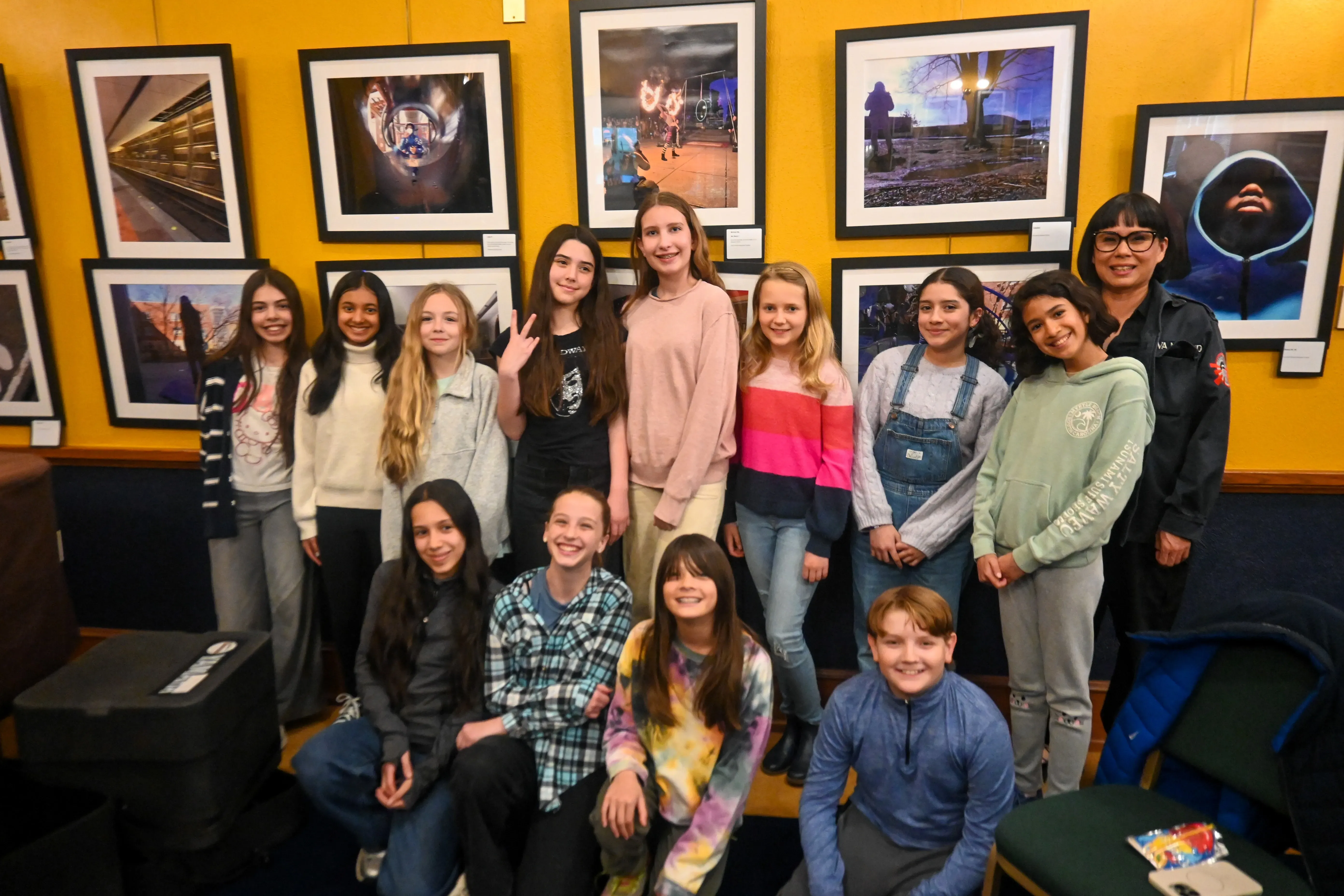 A group of young students poses for a group photo
