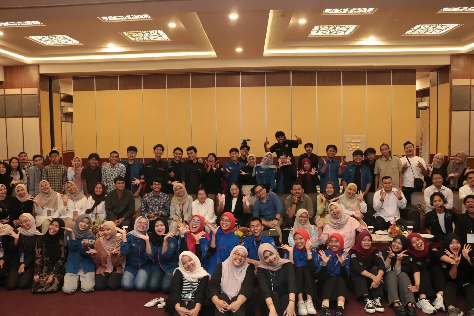 Participants and organizers enjoying the closing photo session