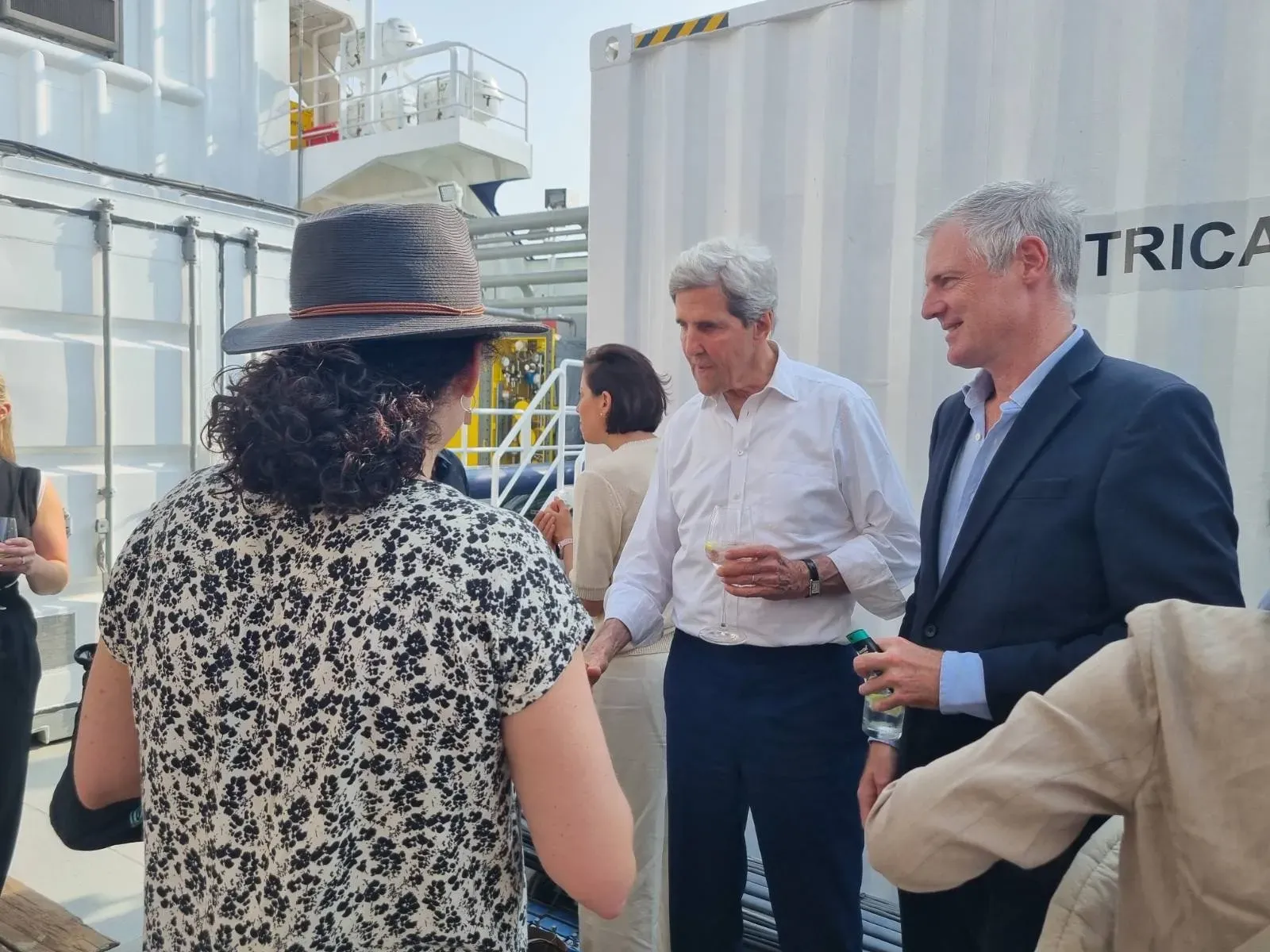 Former US secretary of state John Kerry and UK politician Zac Goldsmith meeting fellows on the Green Pioneer.