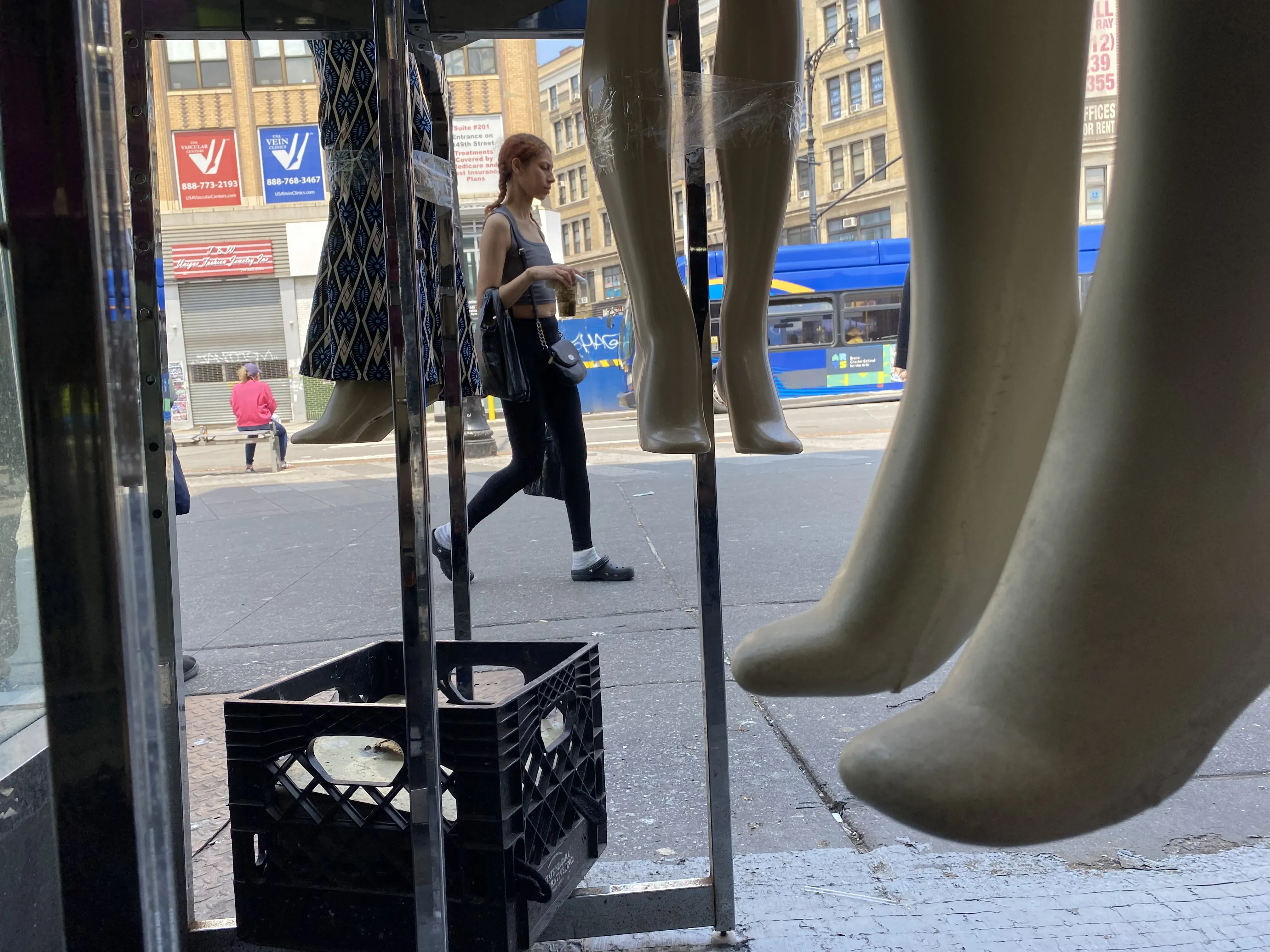 Mannequins hang in store