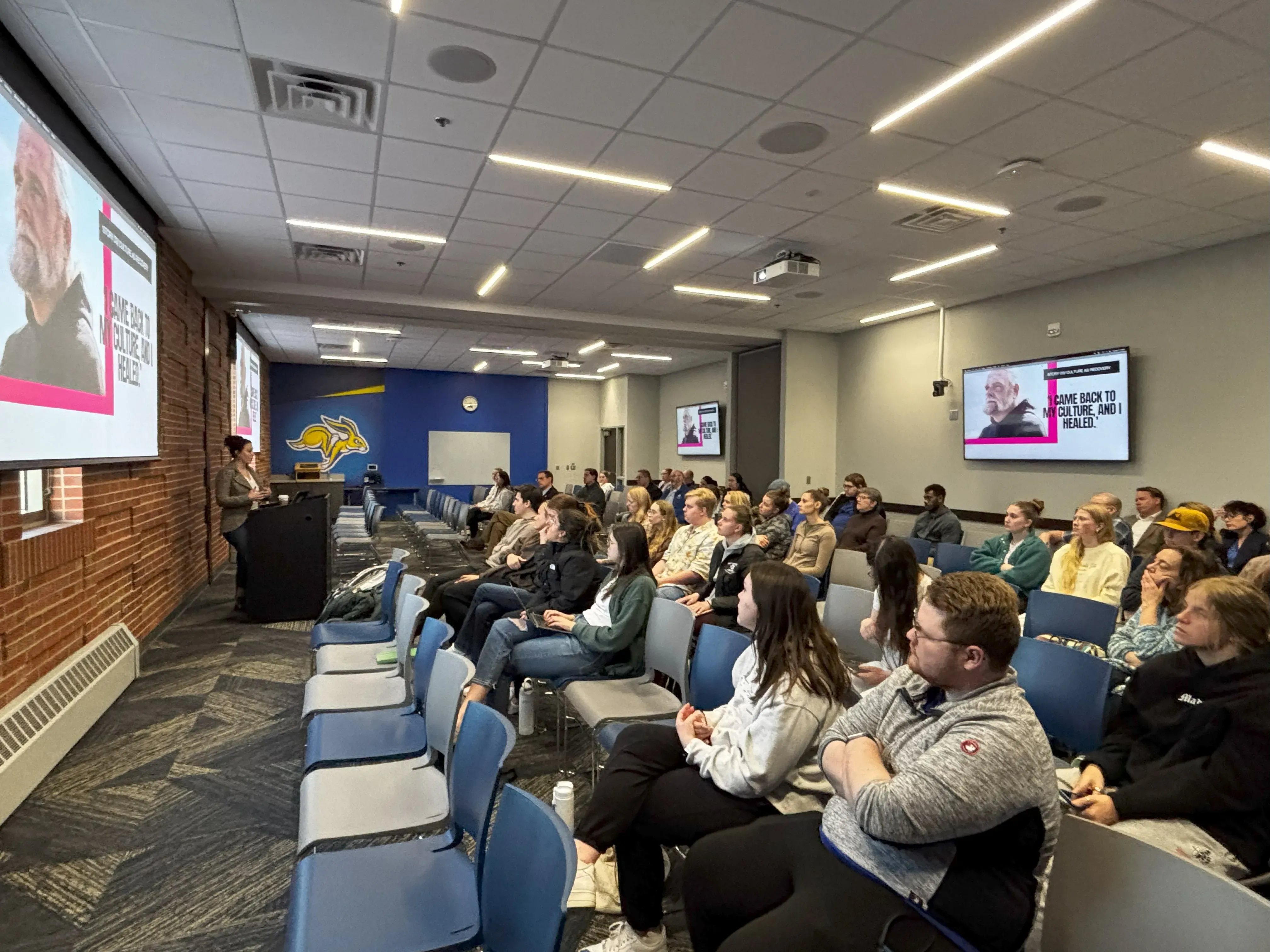 Pulitzer Center grantee Elyse Wild shares her Center-supported project on the opioid crisis in Native American communities with South Dakota State University students, faculty, and staff on April 8.