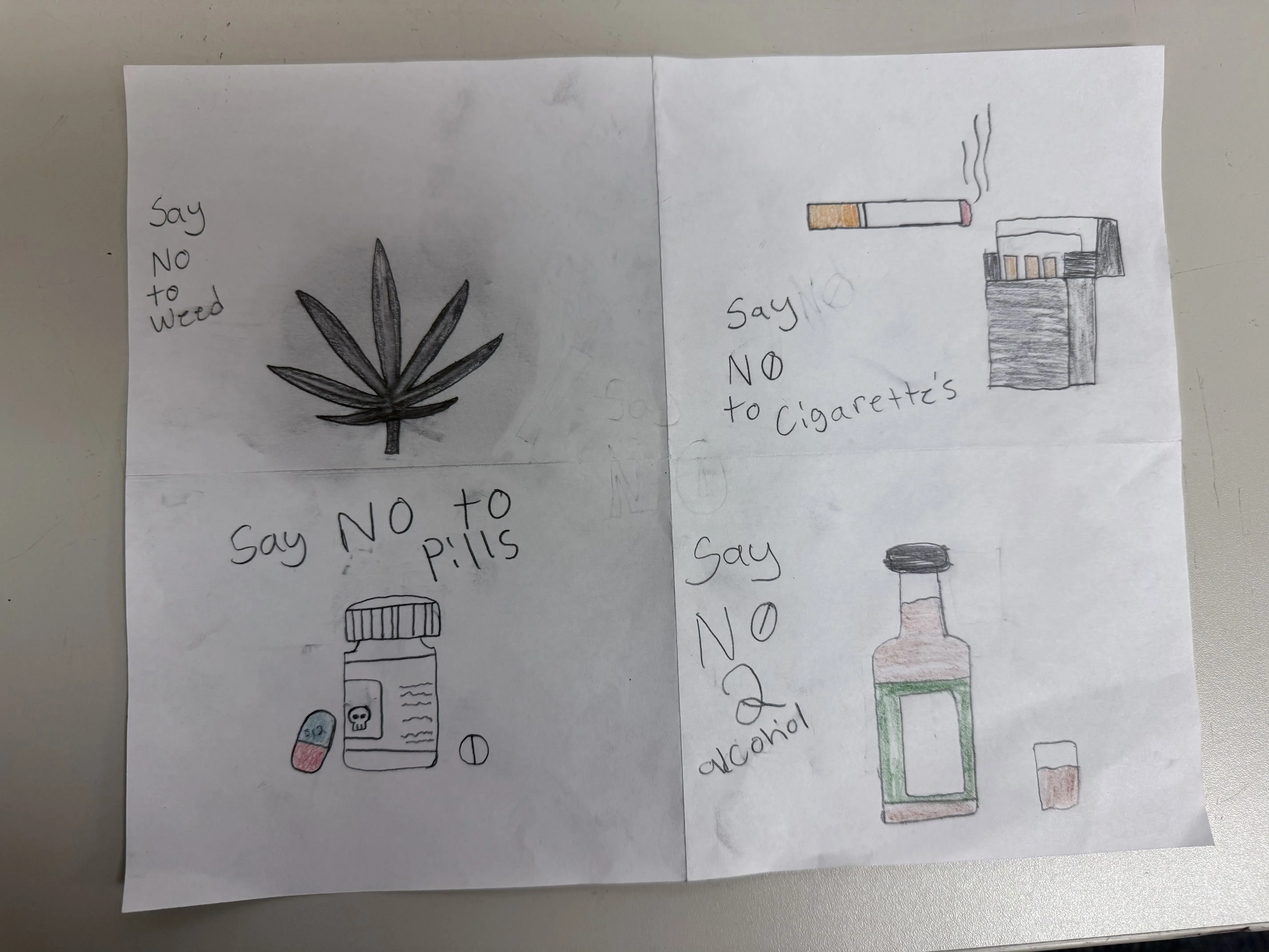 student pencil-drawn campaign poster against drugs and alcohol
