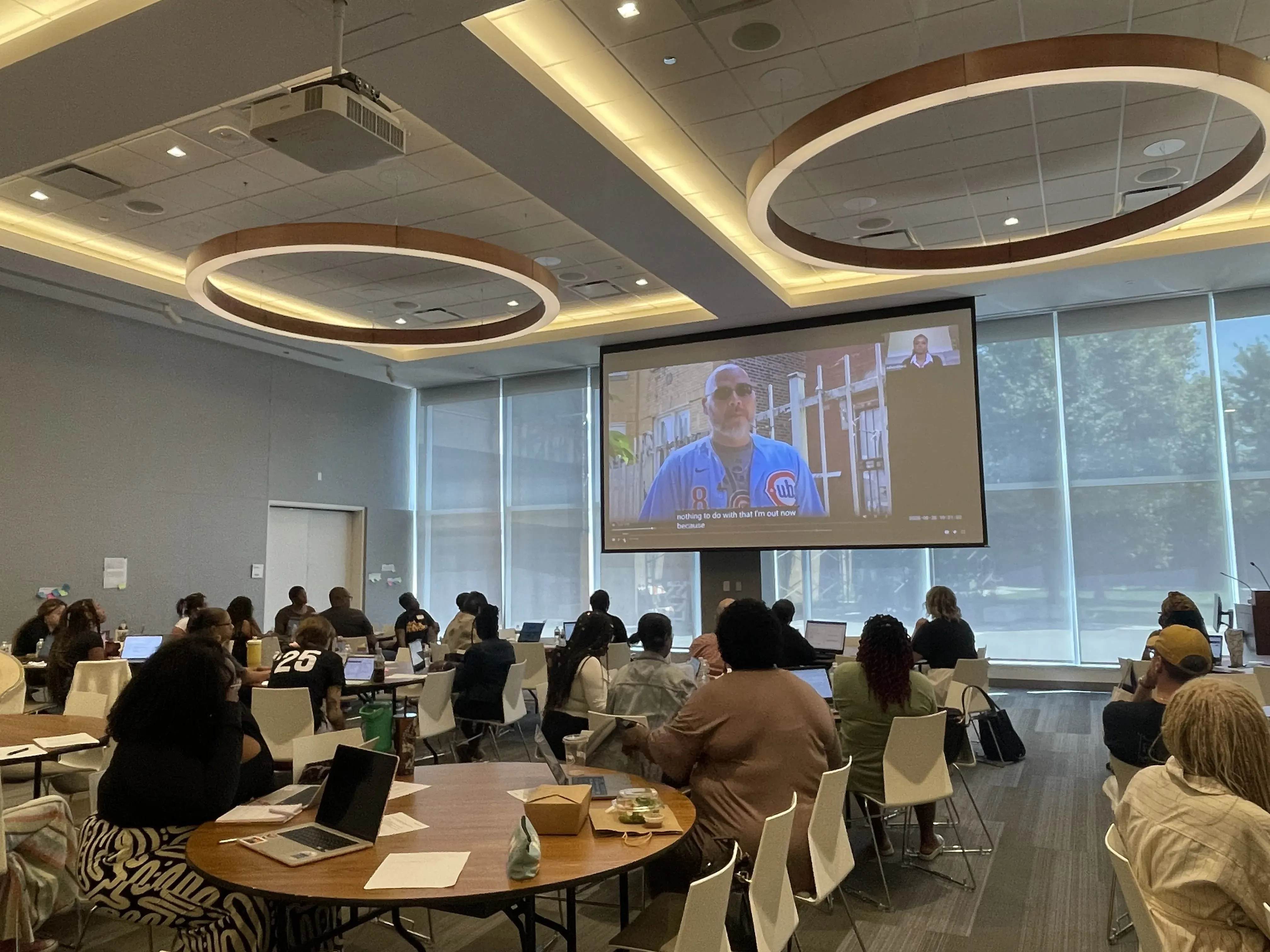Teachers watch Ashonti Ford's presentation