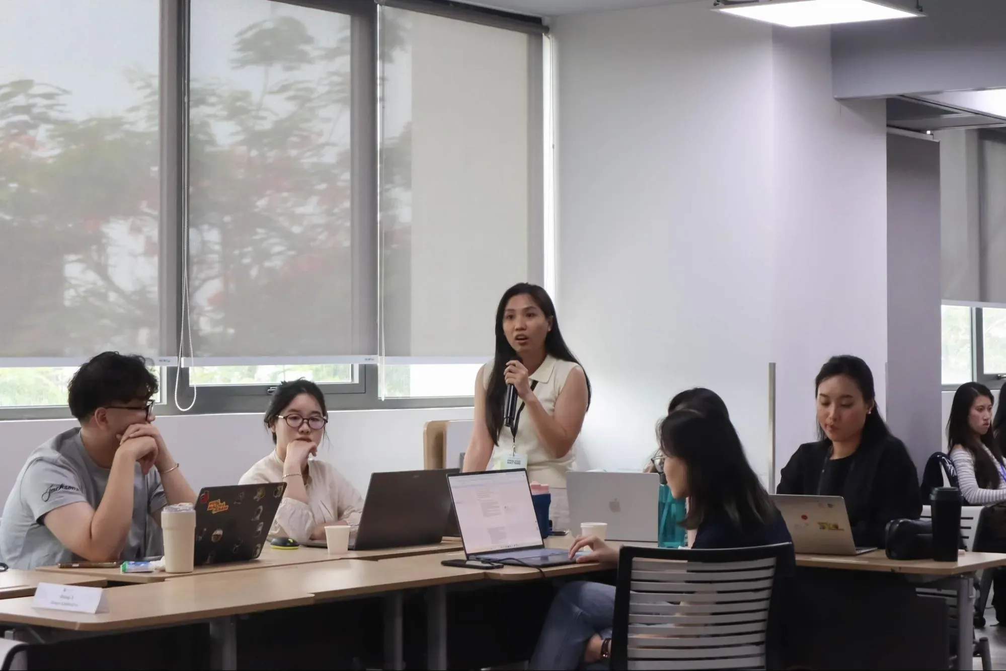Students present their draft op-ed to the class at Van Lang University, Image by Huynh Tan Loi. Vietnam, 2026. 