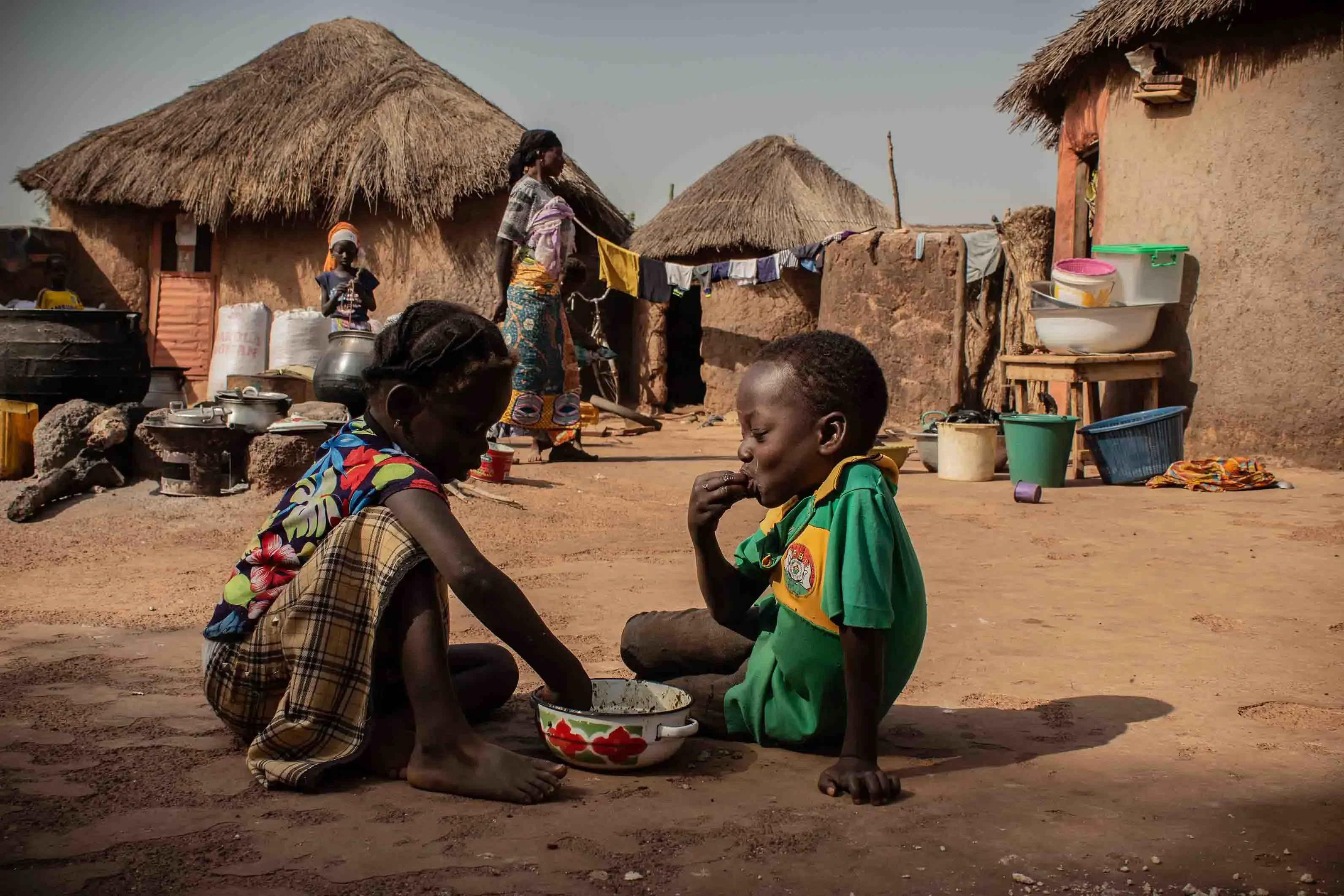 Children in Alimatu Alidu’s household, shown here, enjoy a dish made from cowpea. Image by Ankur Paliwal. Ghana, 2019.