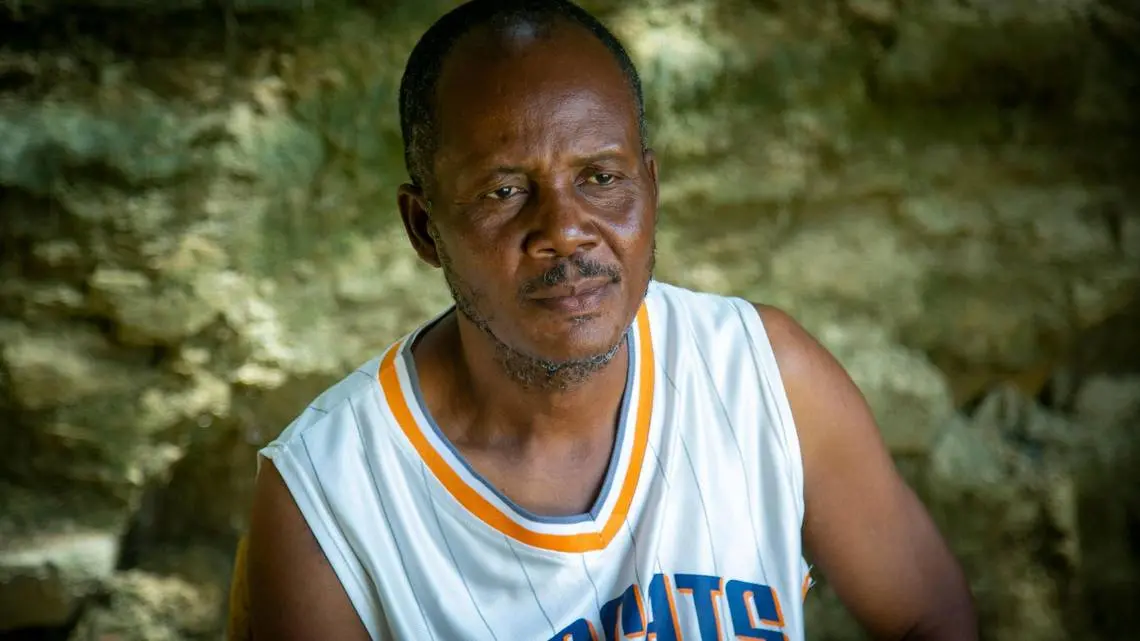 a man in a basketball jersey 