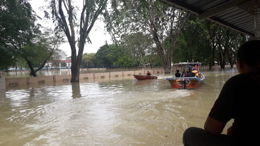 flooded streets with boats