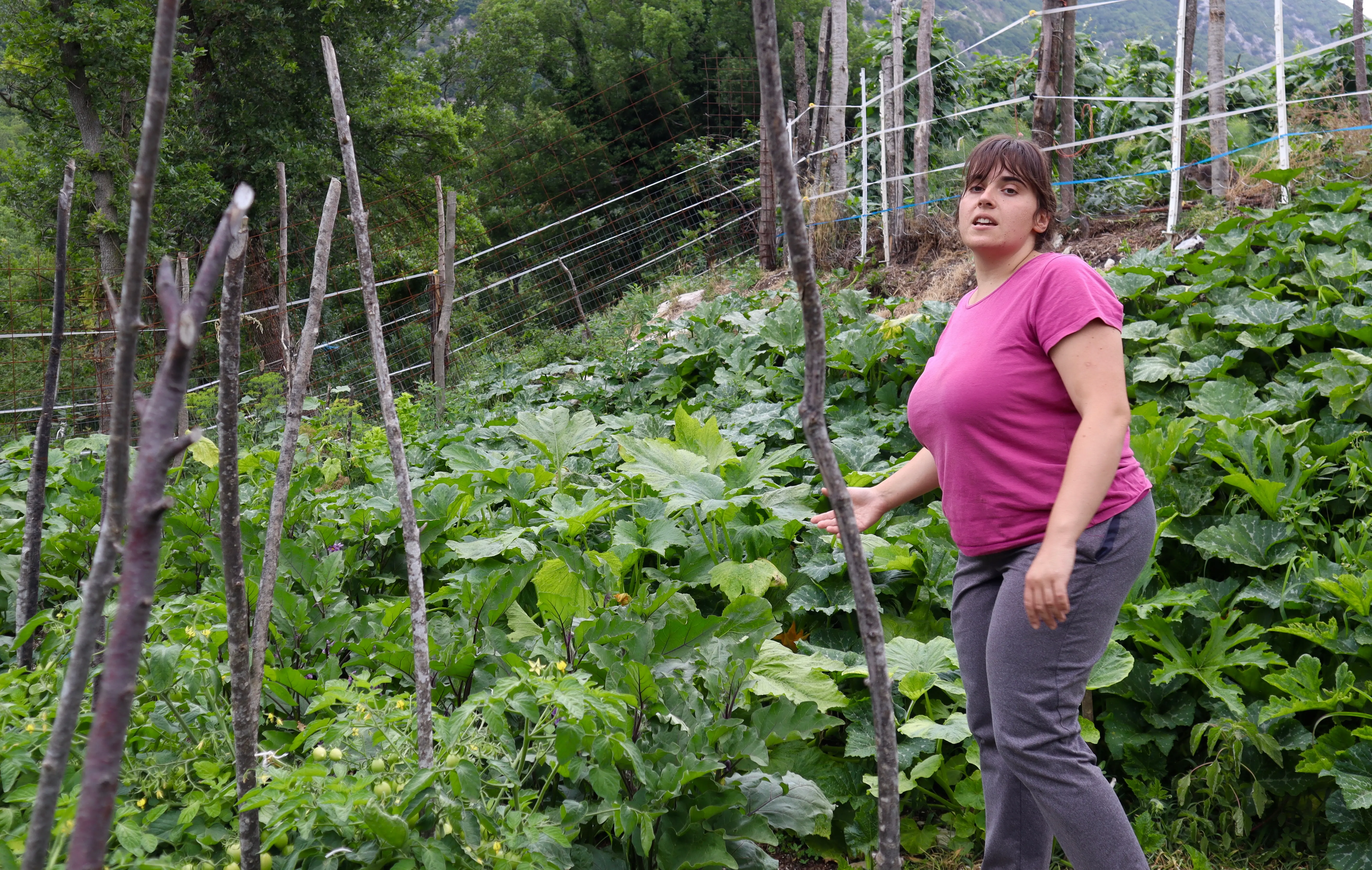 Women stands in front of crop