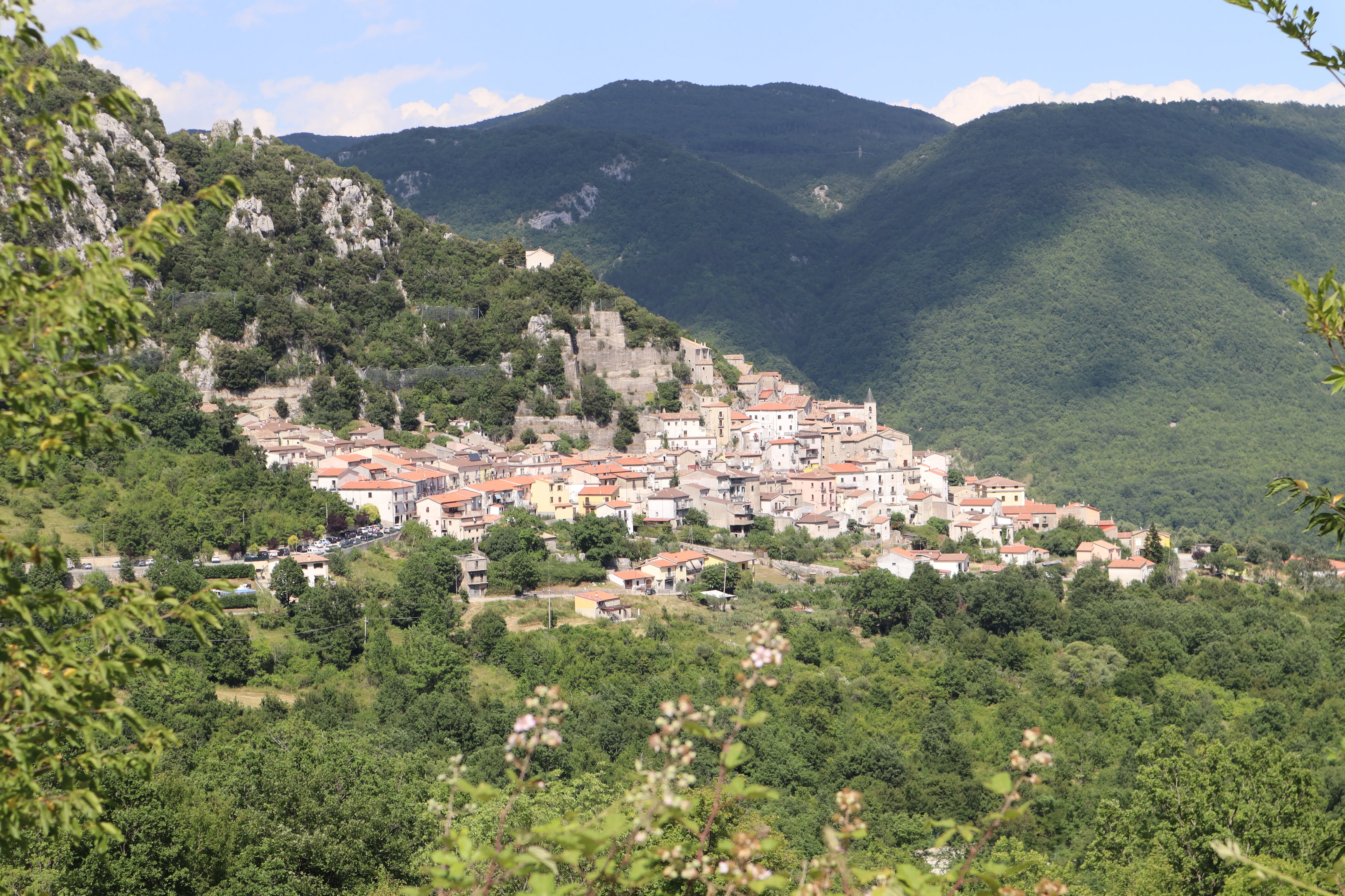 a view of medieval village tucked into mountainside