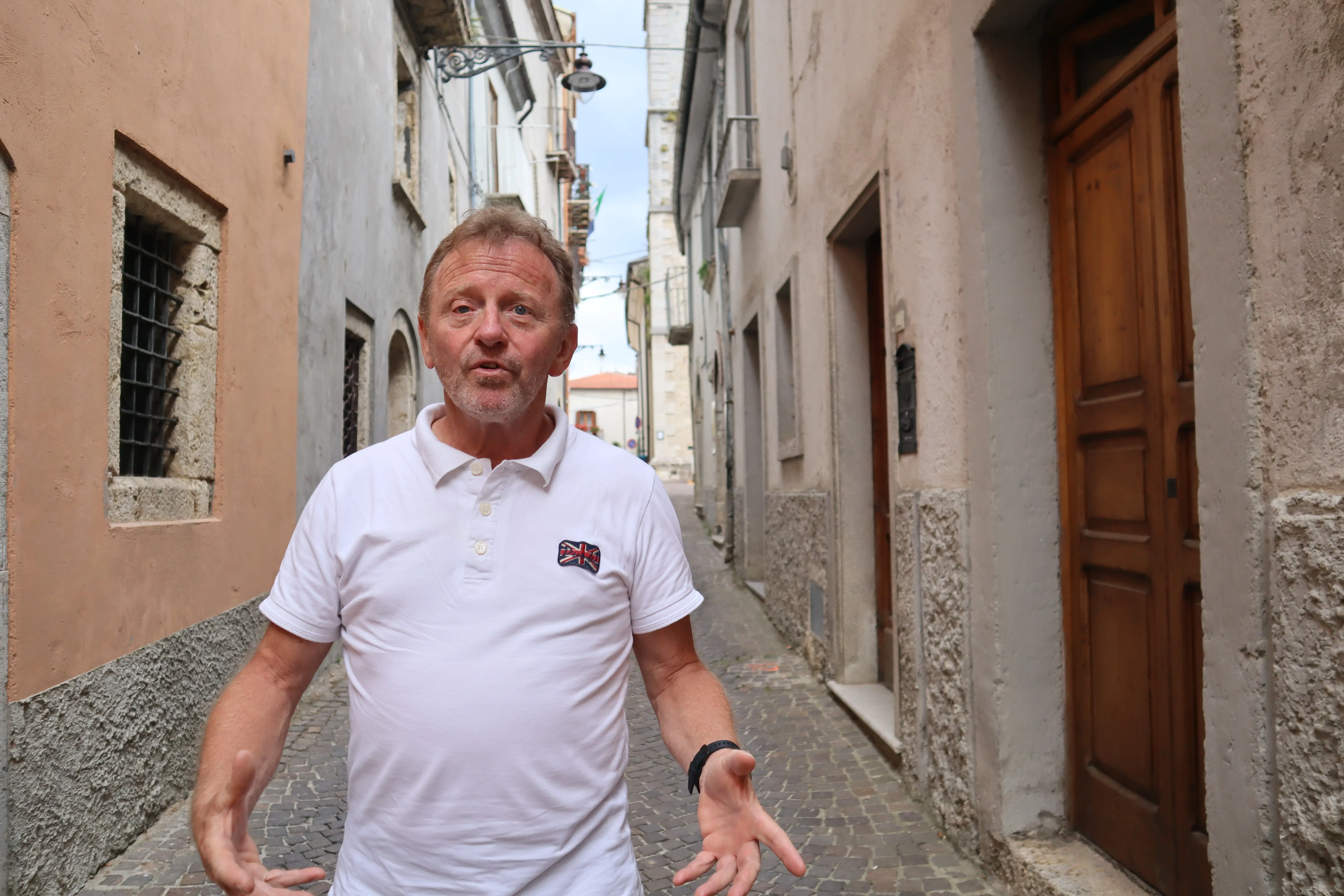 A man walks through town