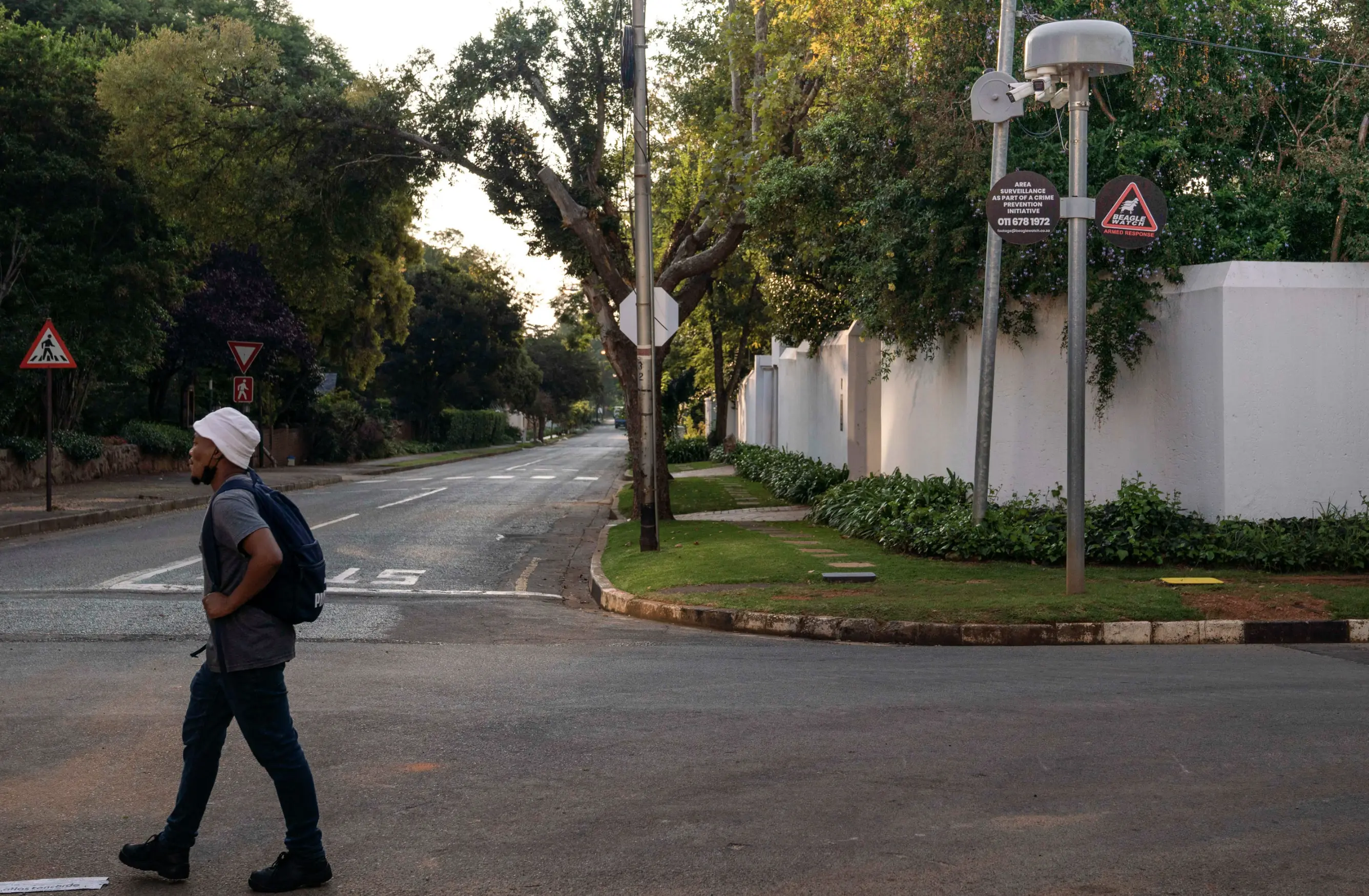 Man walking across the street