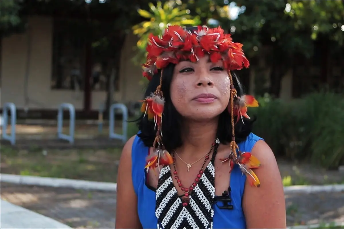 Arene Susui poses in front of Federal University of Roraima.