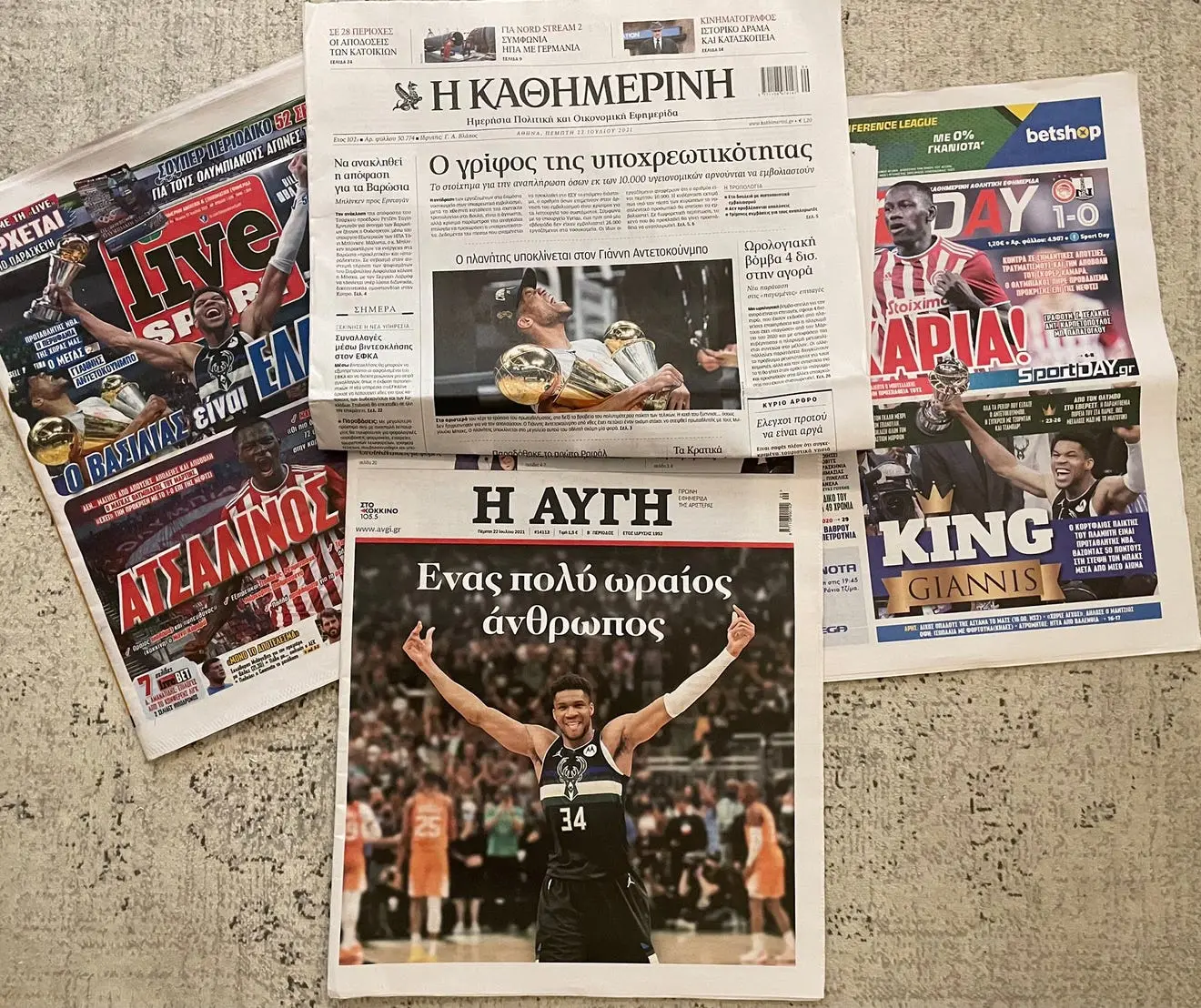 Newspaper front pages in Athens, Greece showing the NBA Championship win of the Milwaukee Bucks