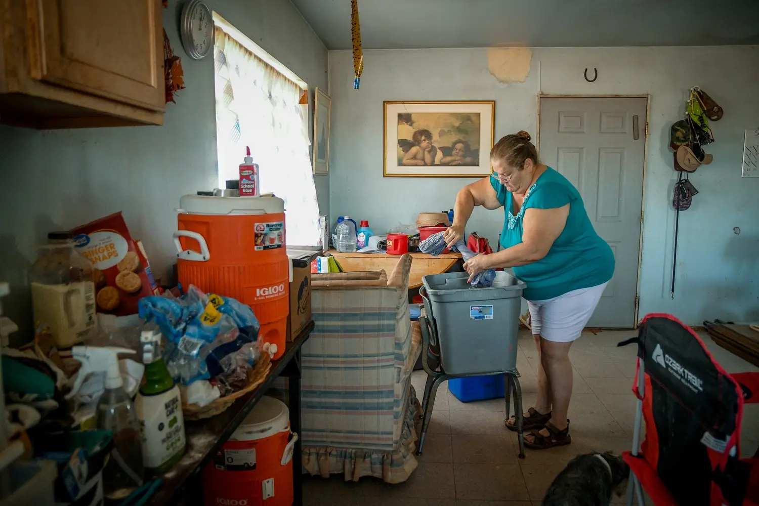 Rolanda Tohannie stands in a house. Image by Mary F. Calvert. United States, 2020.