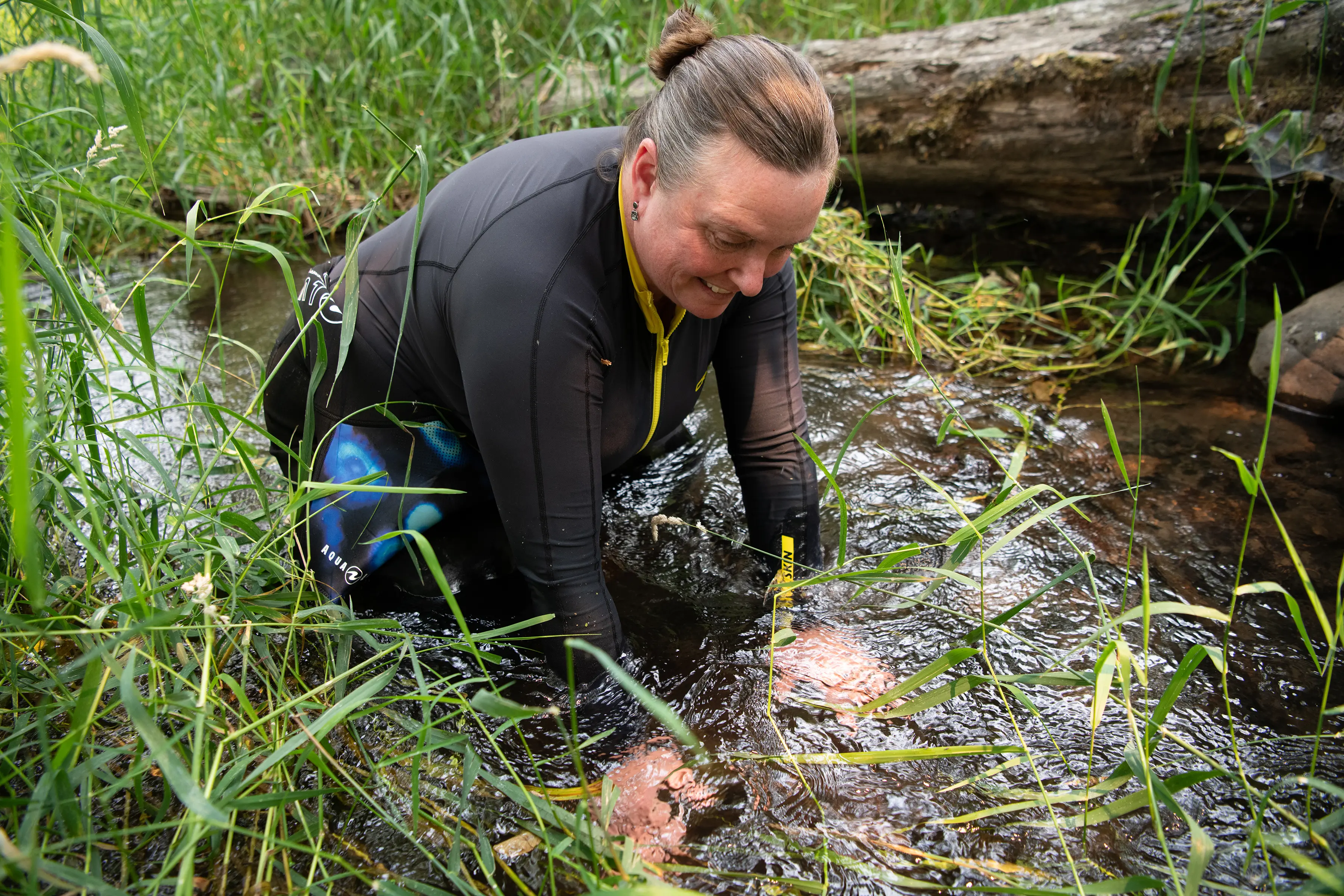 Christine O'Brien hunts for freshwater mussels