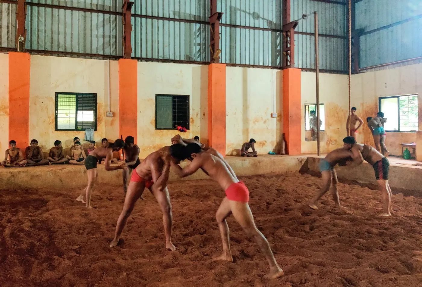 Boys in India wrestle