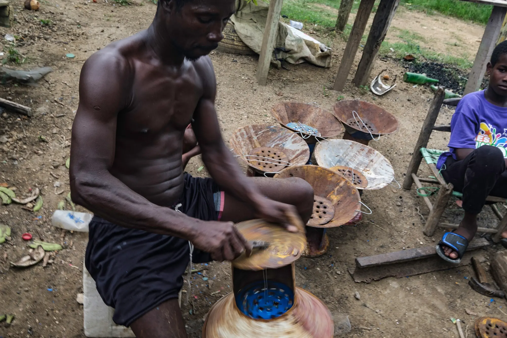 A man makes a stove