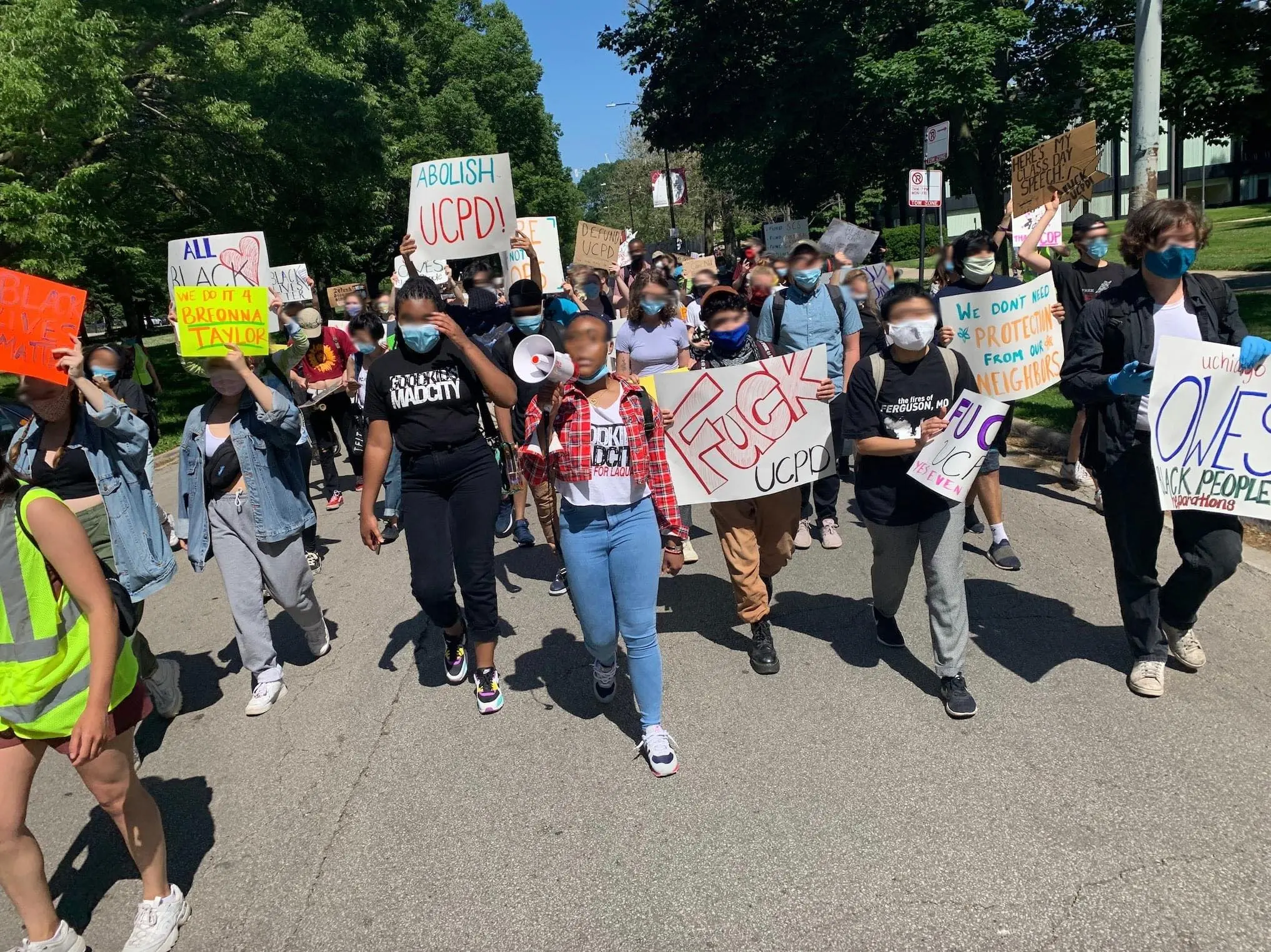 Members of #CareNotCops march