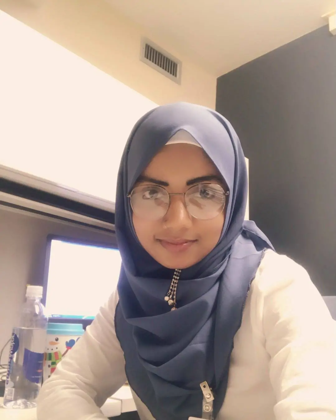 Azimah Jalil takes a selfie in her office