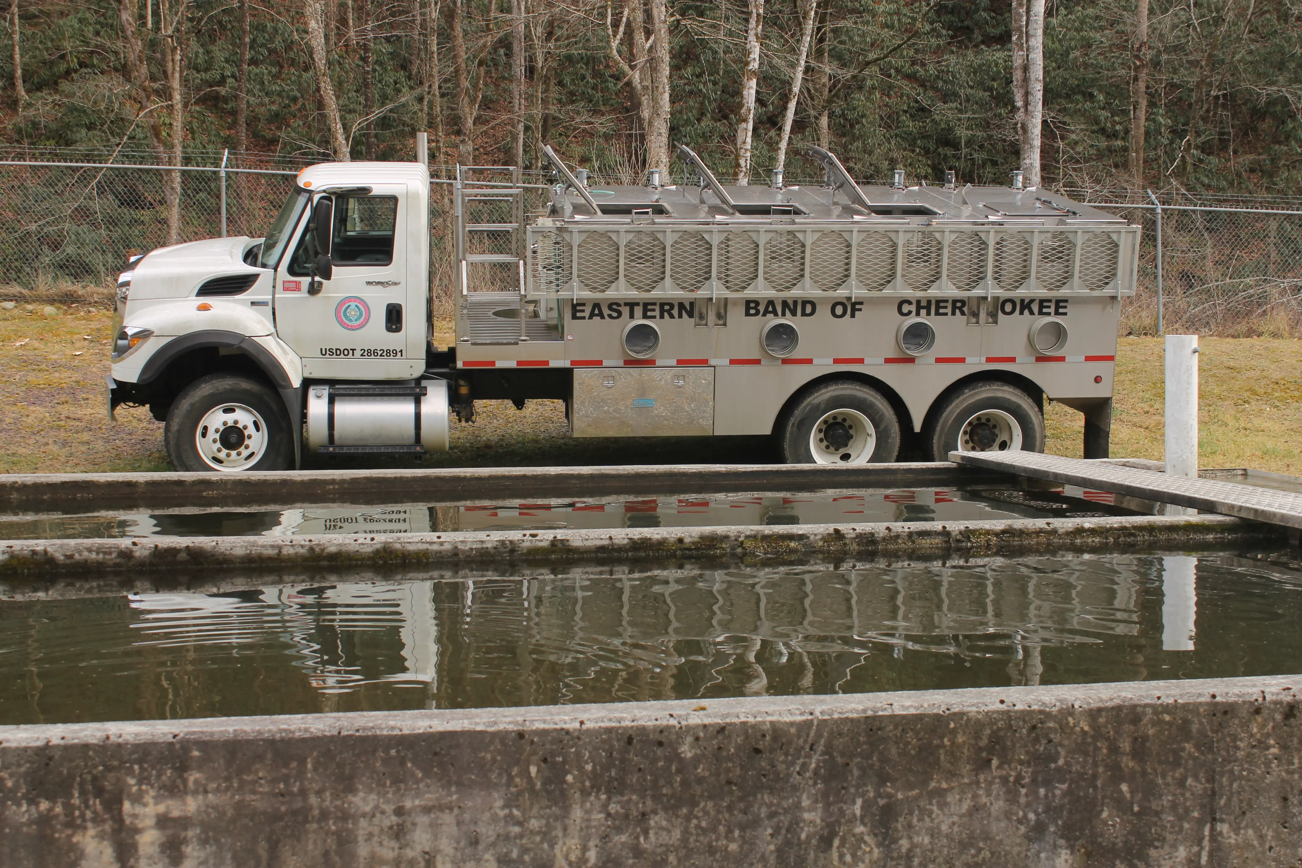 A truck with "Eastern Band of Cherokee" written on in.