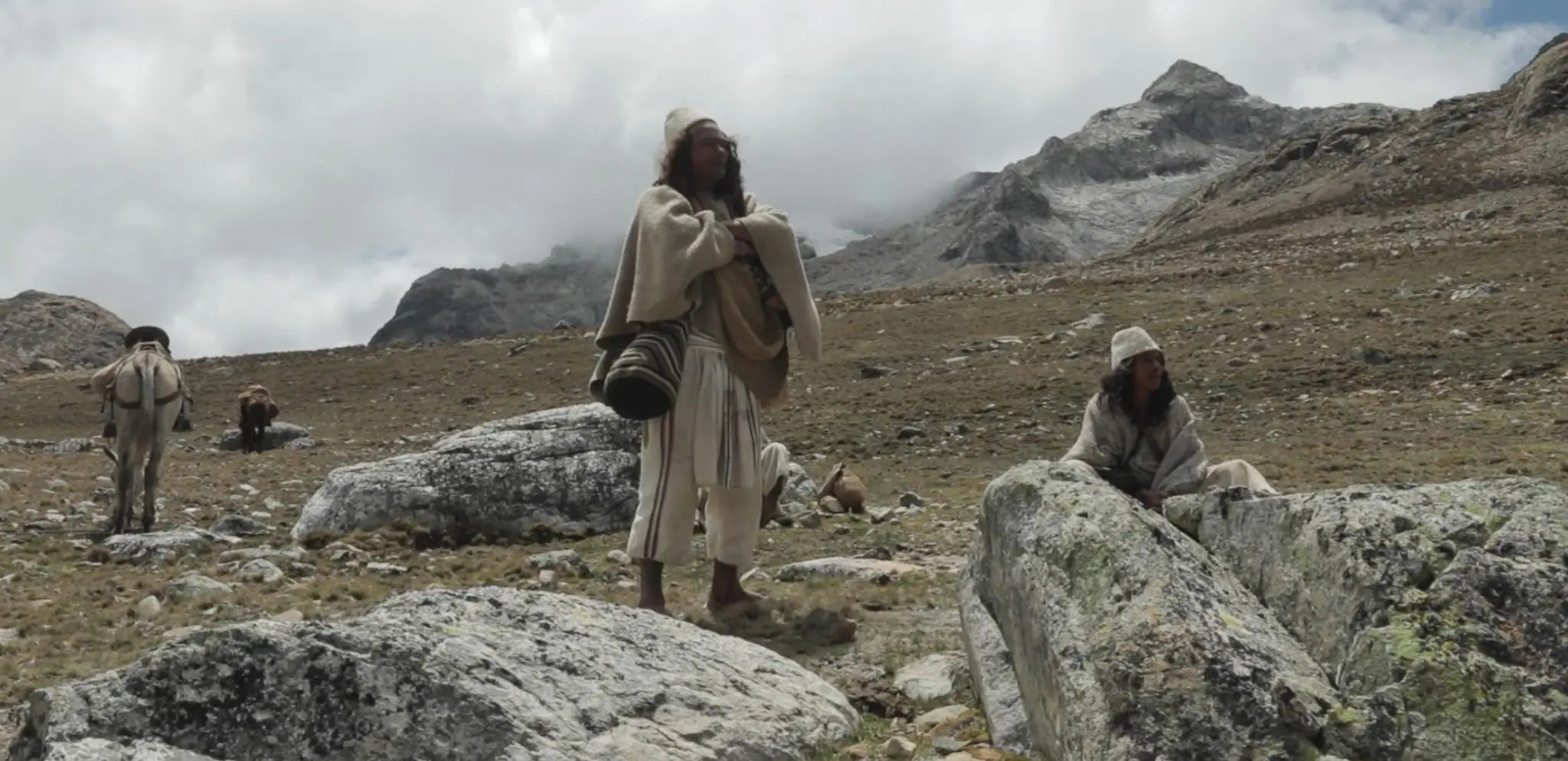 Indigenous gather on a hill