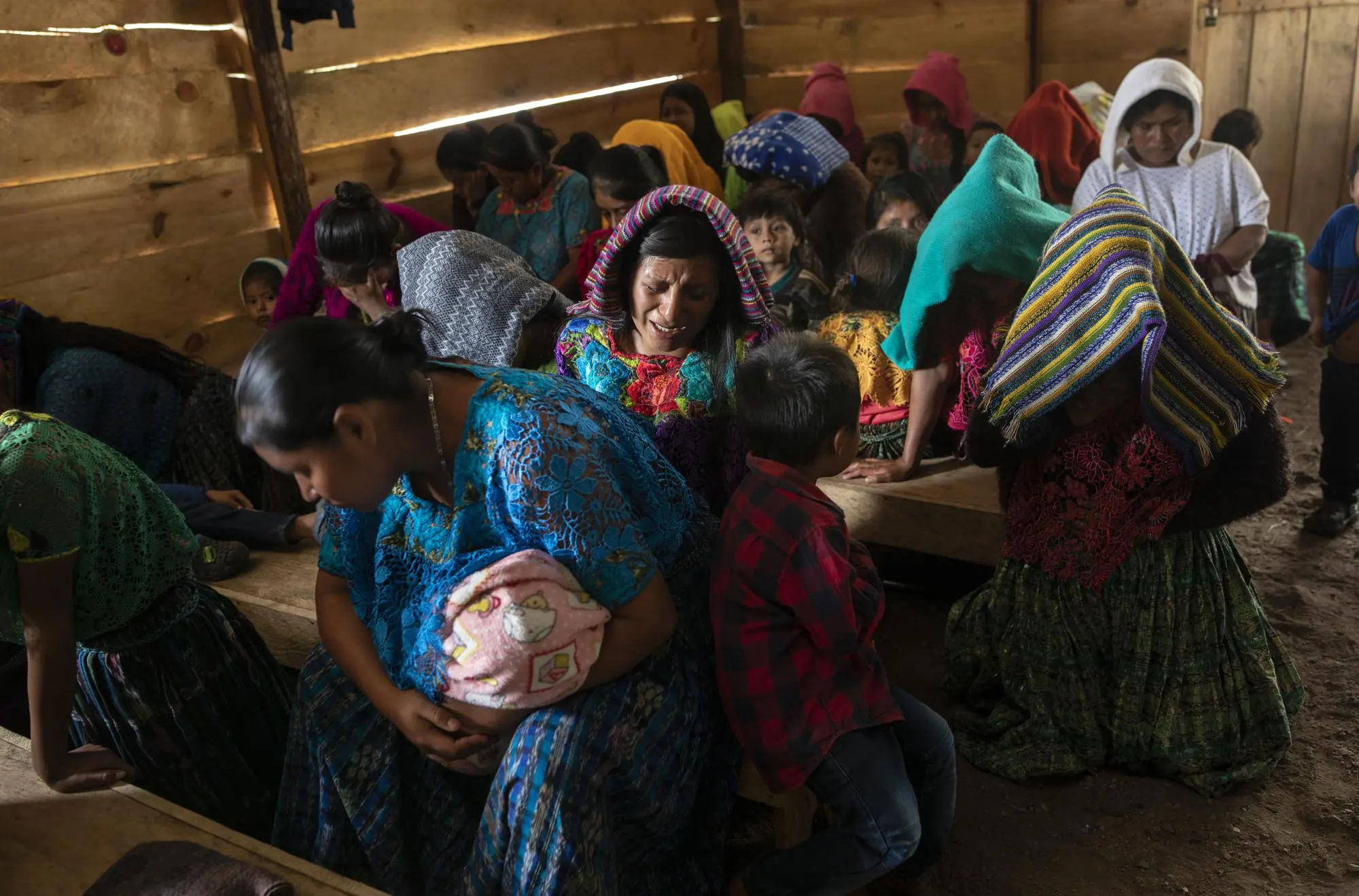 People gather in a church to pray together