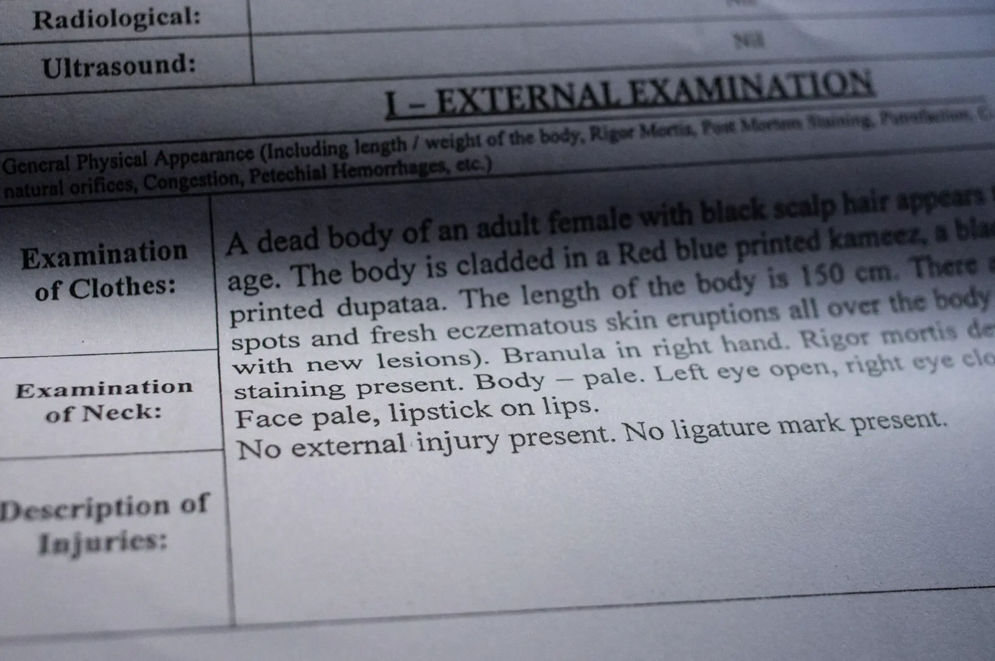 Image of postmortem report.