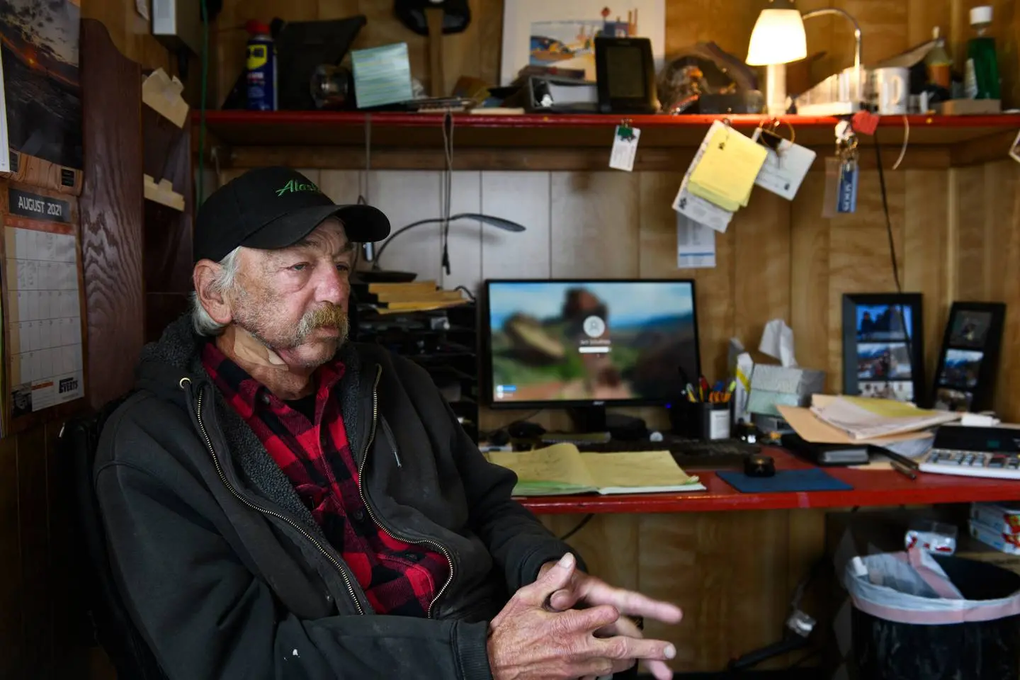 Operations manager for Yukon River fisheries sits in his office