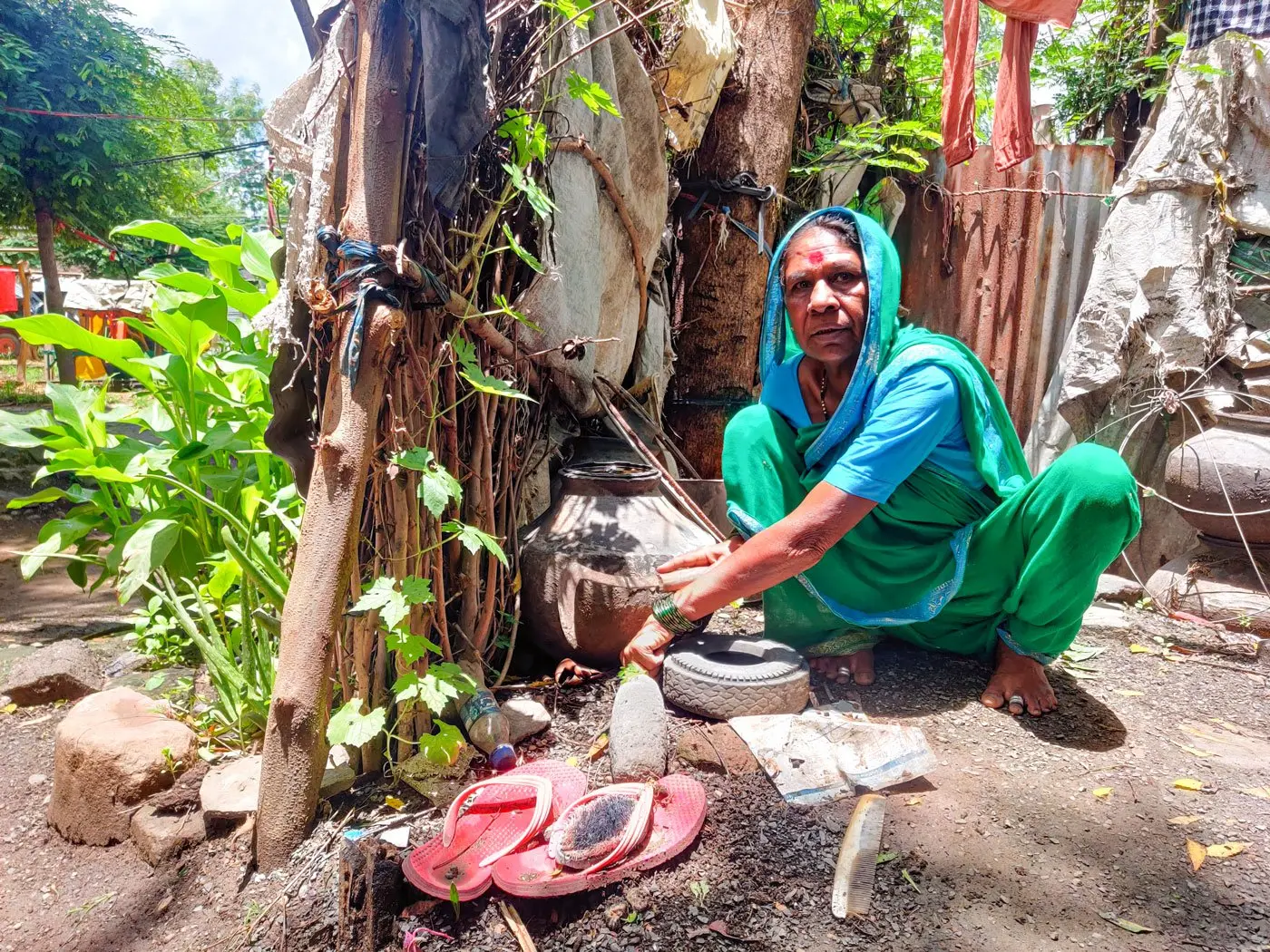 Woman sits on the ground